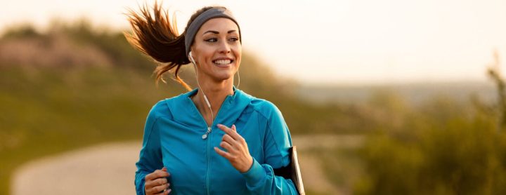 Woman runs while listening to music