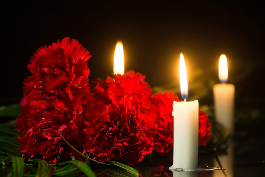 candles and red flowers