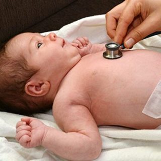 Baby with Stethoscope to Heart