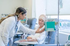 Caucasian senior woman receiving chemotherapy treatment at the hospital