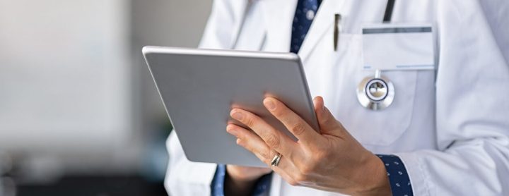 Doctor using tablet